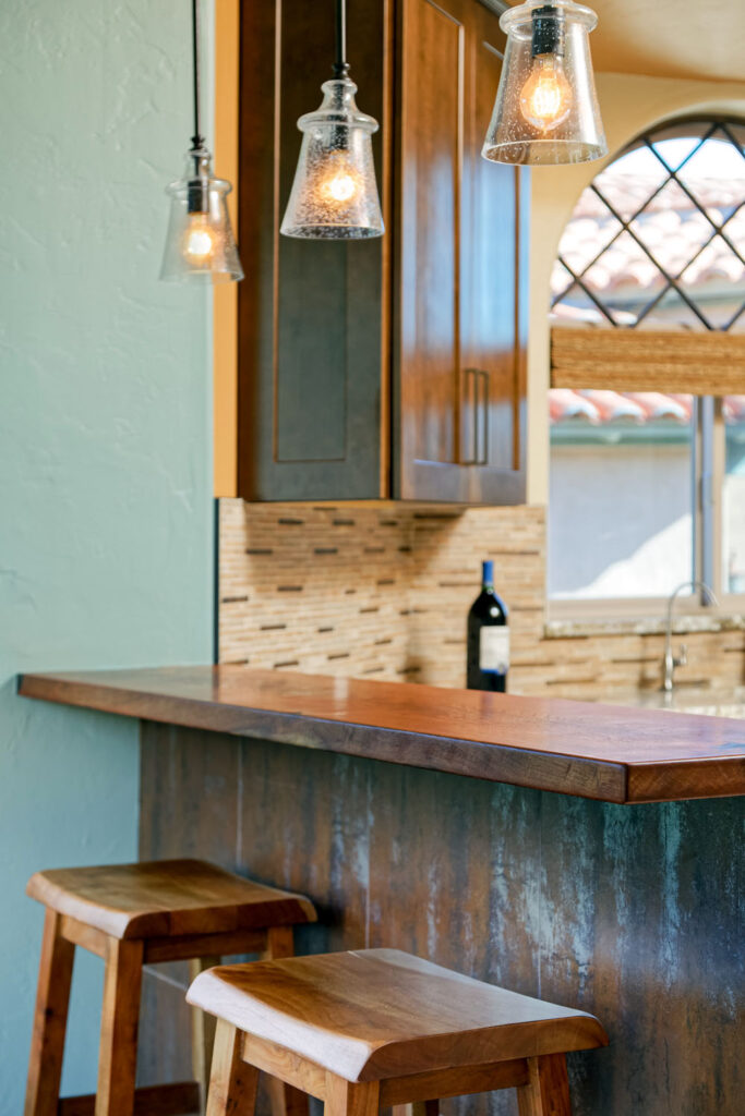 Mesquite Bar Counter with copper tiled pony wall facade